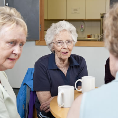 Women talking together over a cup of tea