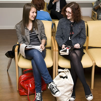 Teenage girls waiting for more tests in the clinic waiting room
